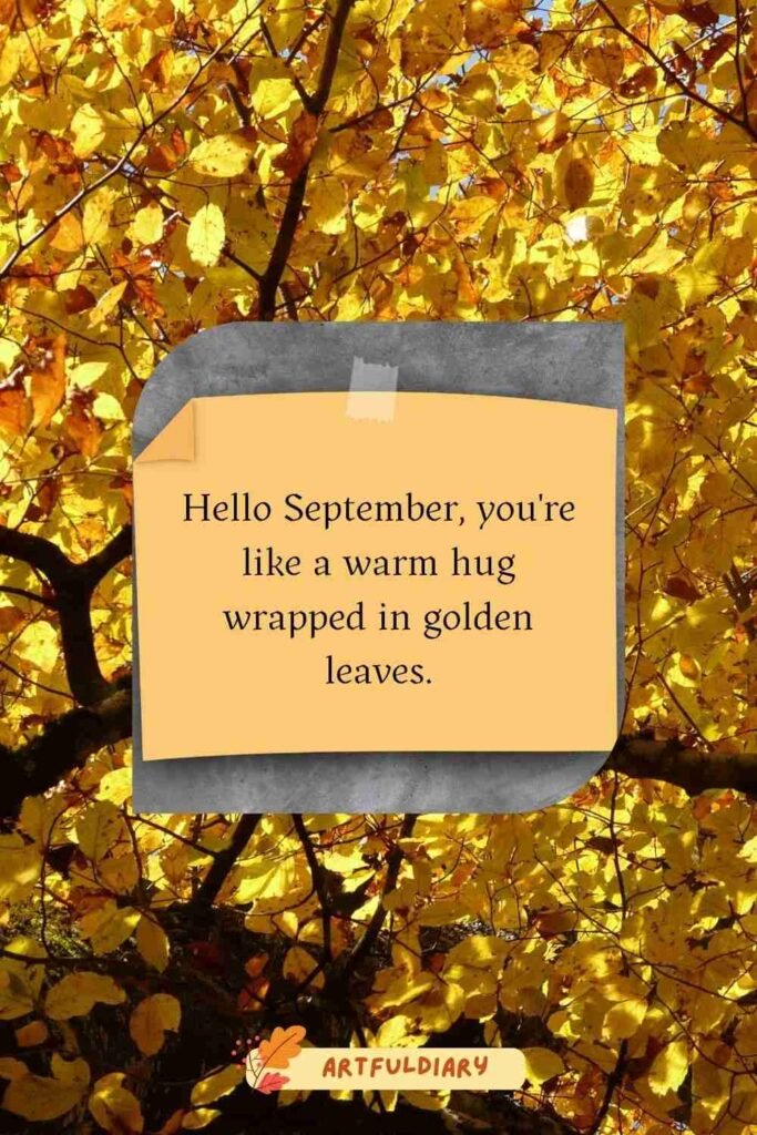 Hello September, you're like a warm hug wrapped in golden leaves, cute hello september quotes